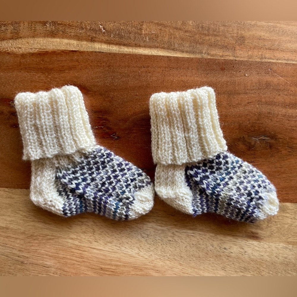 Last chance! 
Hand knit Baby Socks—that will actually stay on your baby’s feet!